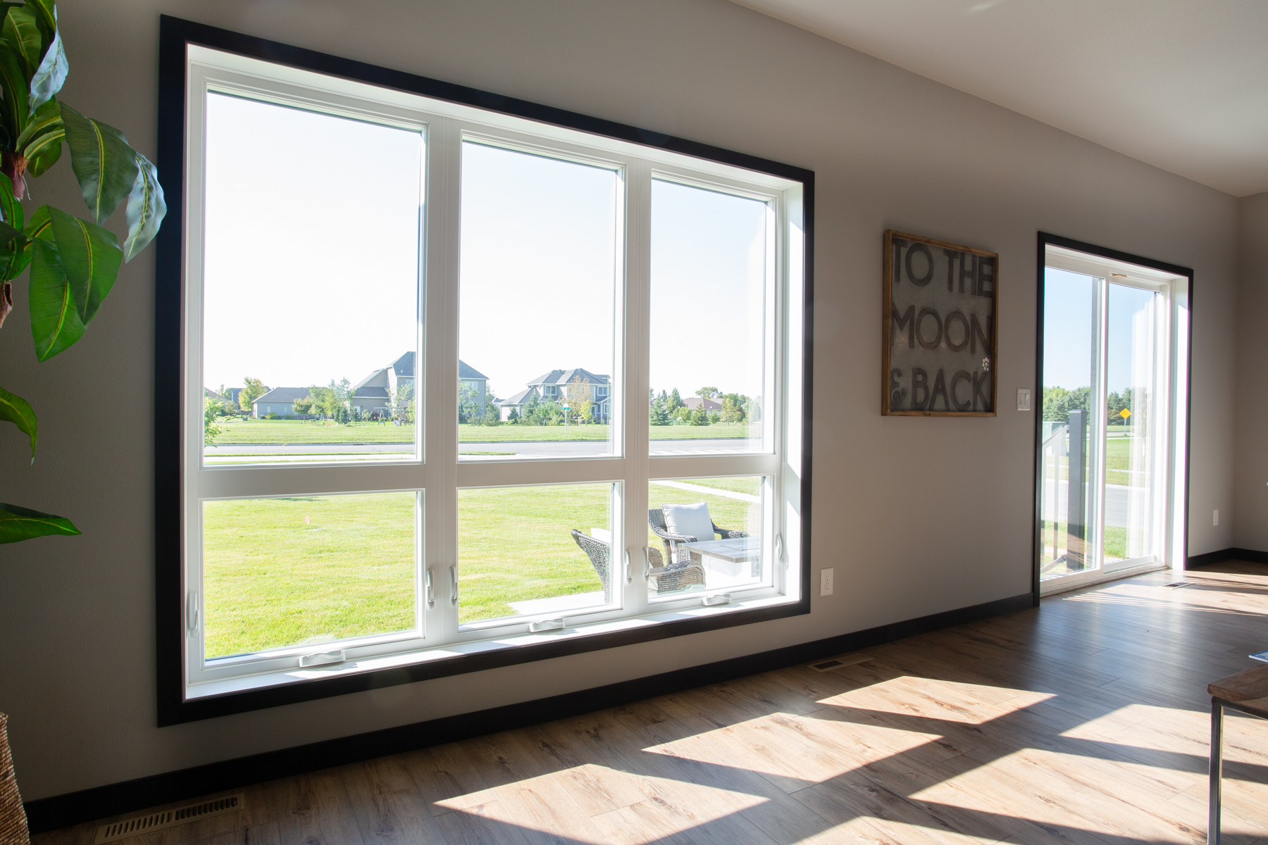 Living room window with sliding glass door in view