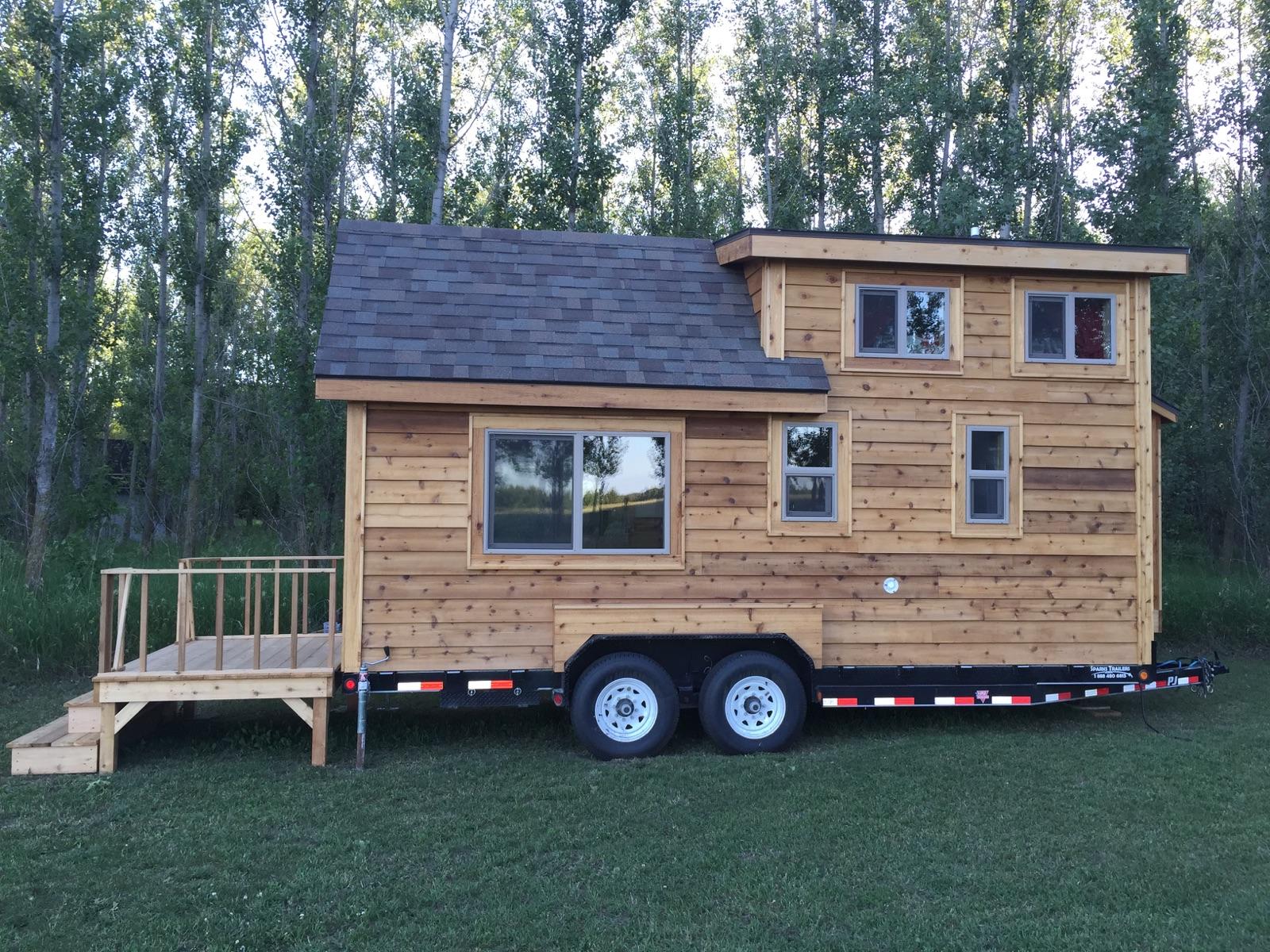 tiny house on a trailer featuring Vector windows