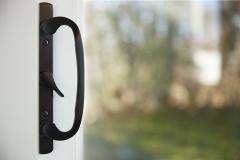Door handle with a lock on a sliding door