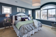 Large beautiful window installation in a master bedroom